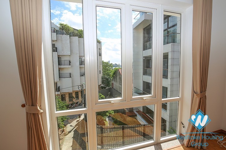 Gorgeous house with front yard and top terrace and lake view for rent in Tay Ho, Hanoi